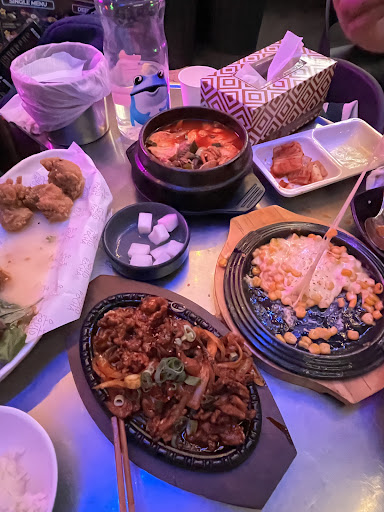 Hot pot, fried chicken, and sharing plates at the table