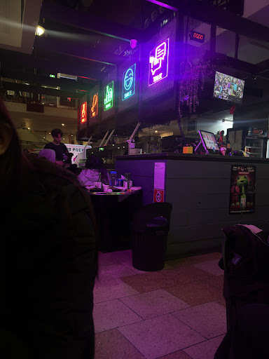 Neon-lit Korean pocha dining room