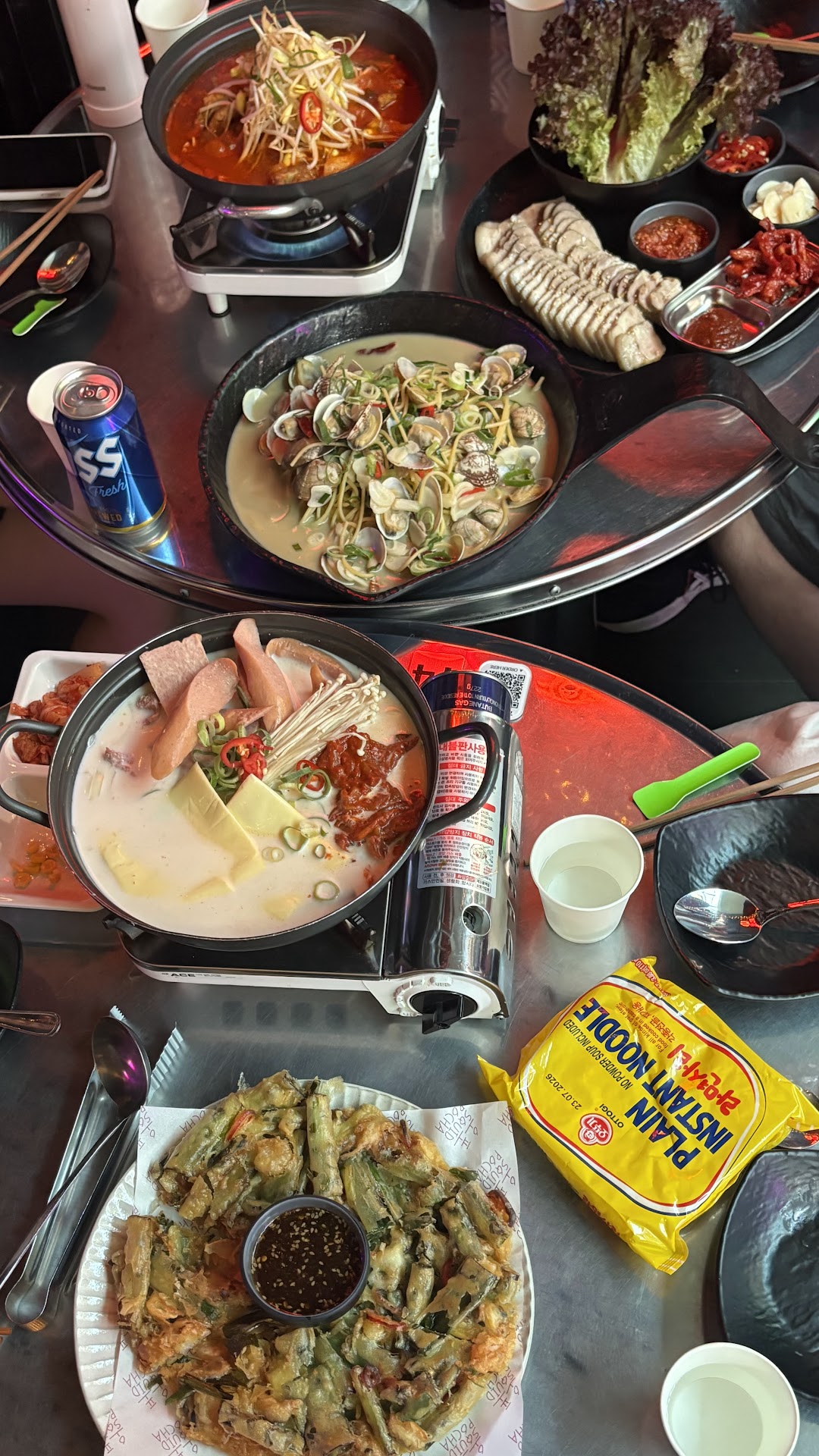Shared Korean hot pots, pancakes, and drinks